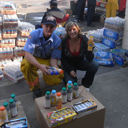 Roseanna Wheeler with firefighter and juice