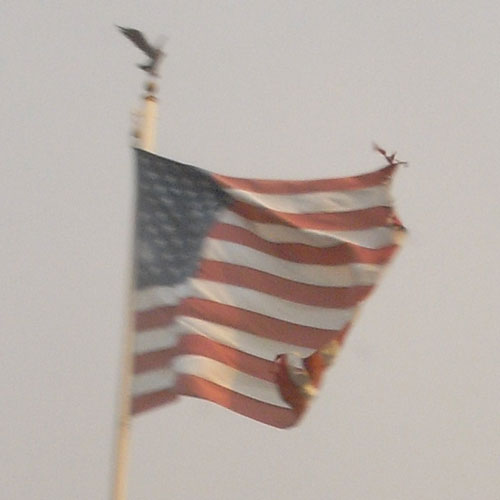 flag ripped by wind